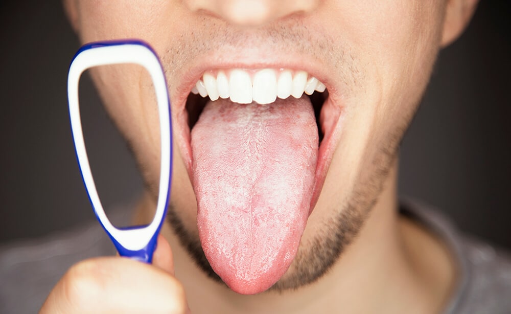 cómo limpiar la lengua raspador